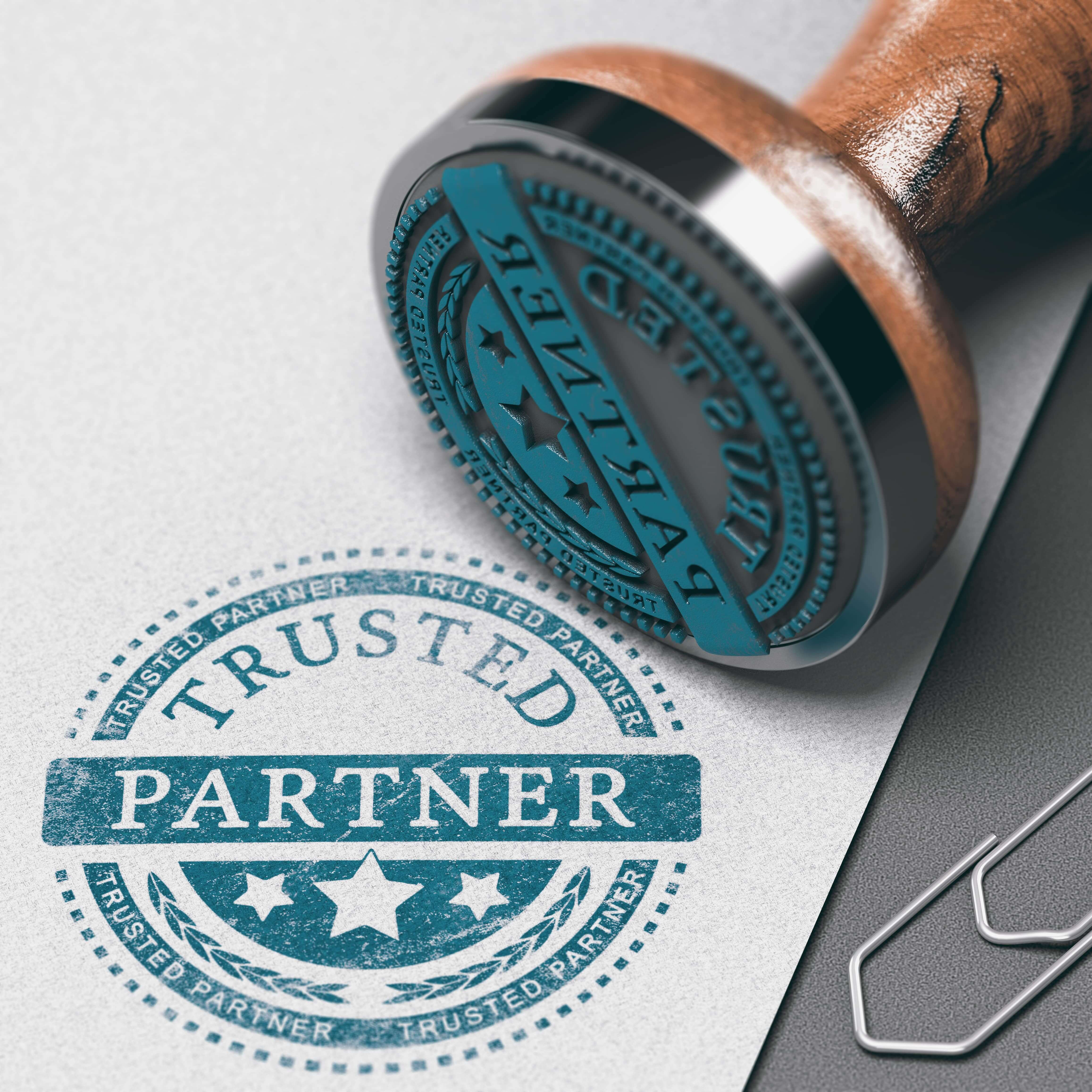 stamp that reads trusted partner
