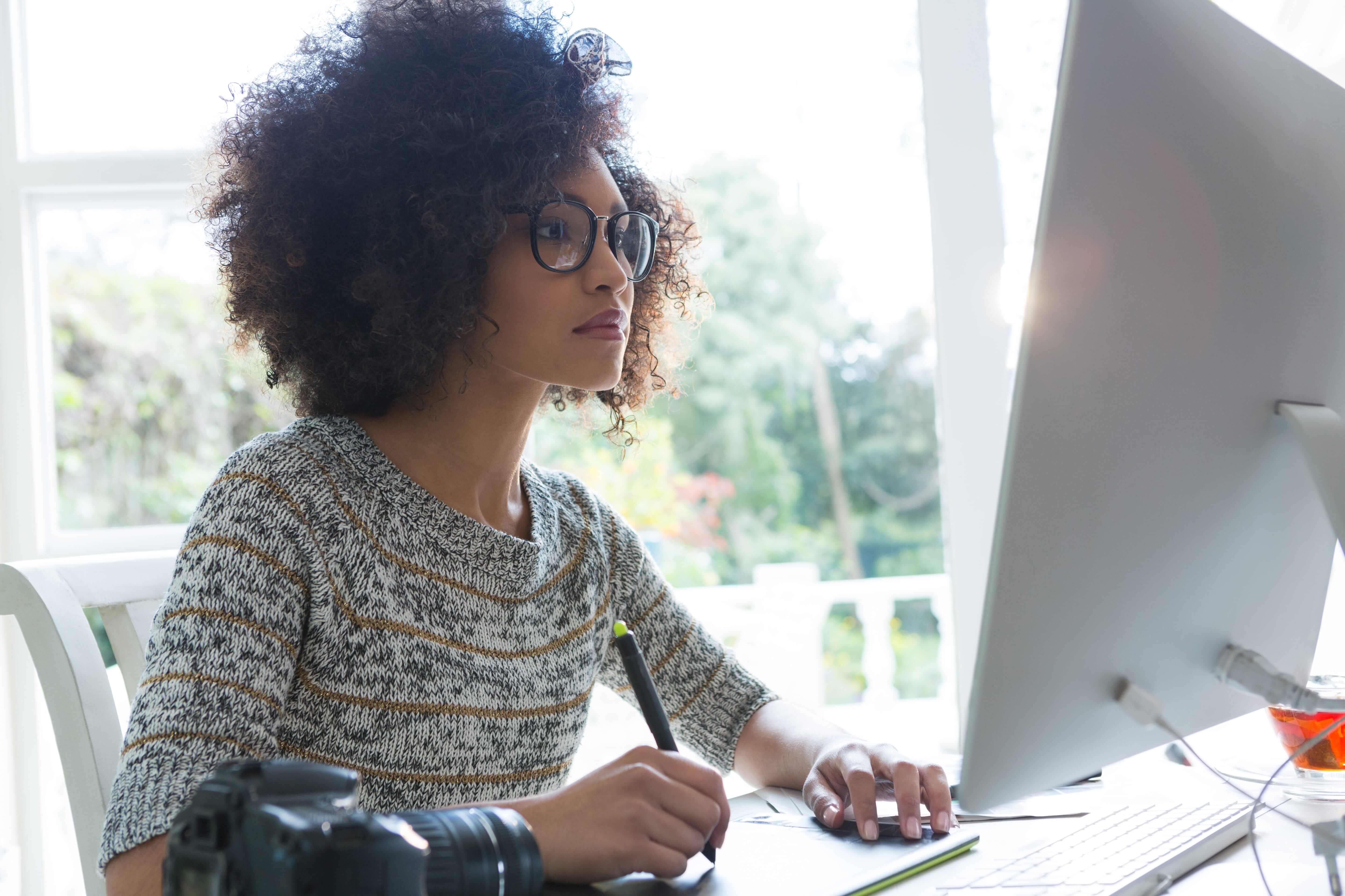 woman doin work on a computer